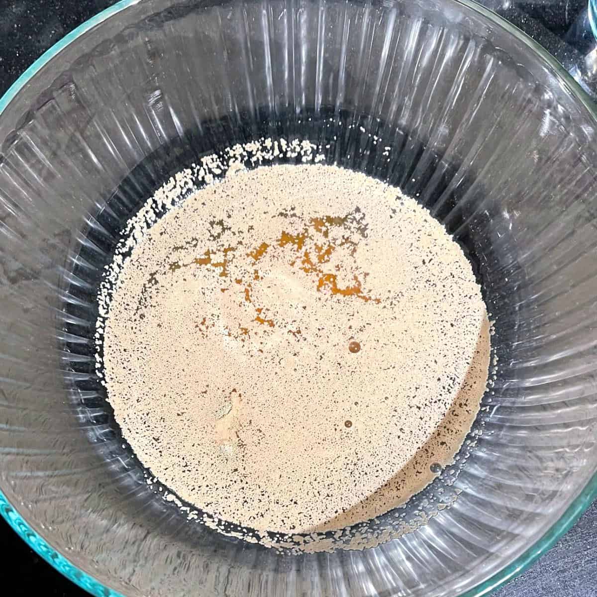 Yeast, water and sugar in large bowl.