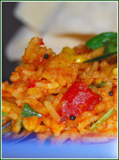Tomato rice in a blue dish