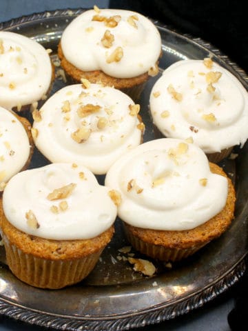 Close up of vegan carrot cupcakes with vegan cream cheese frosting