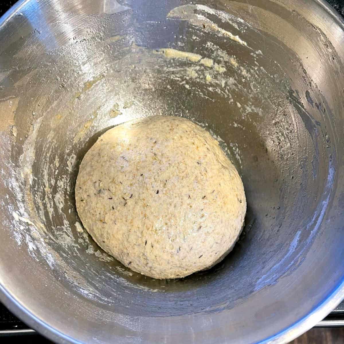 Rye bread dough in bowl before rising.
