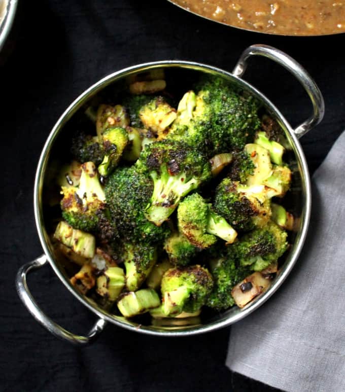 Bowl with garlicky broccoli stir fry with stems and florets
