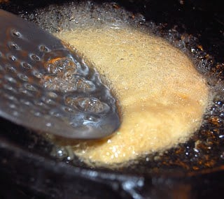 Poori frying in oil.