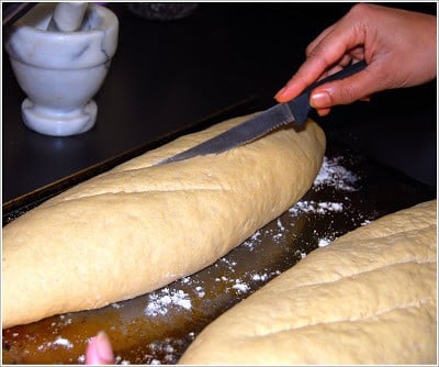 Making cuts in the french bread loaf