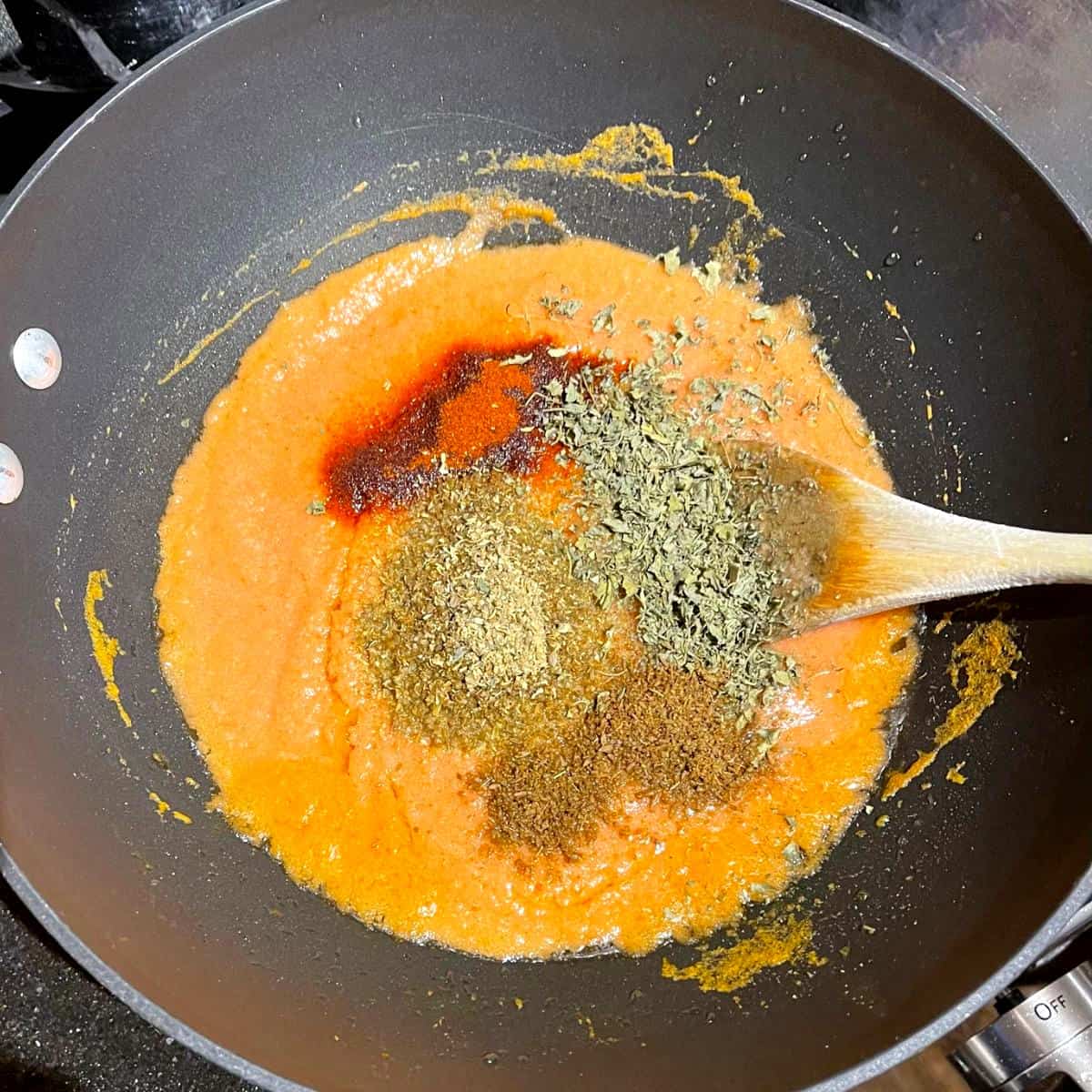 Spices and kasoori methi added to makhani sauce.