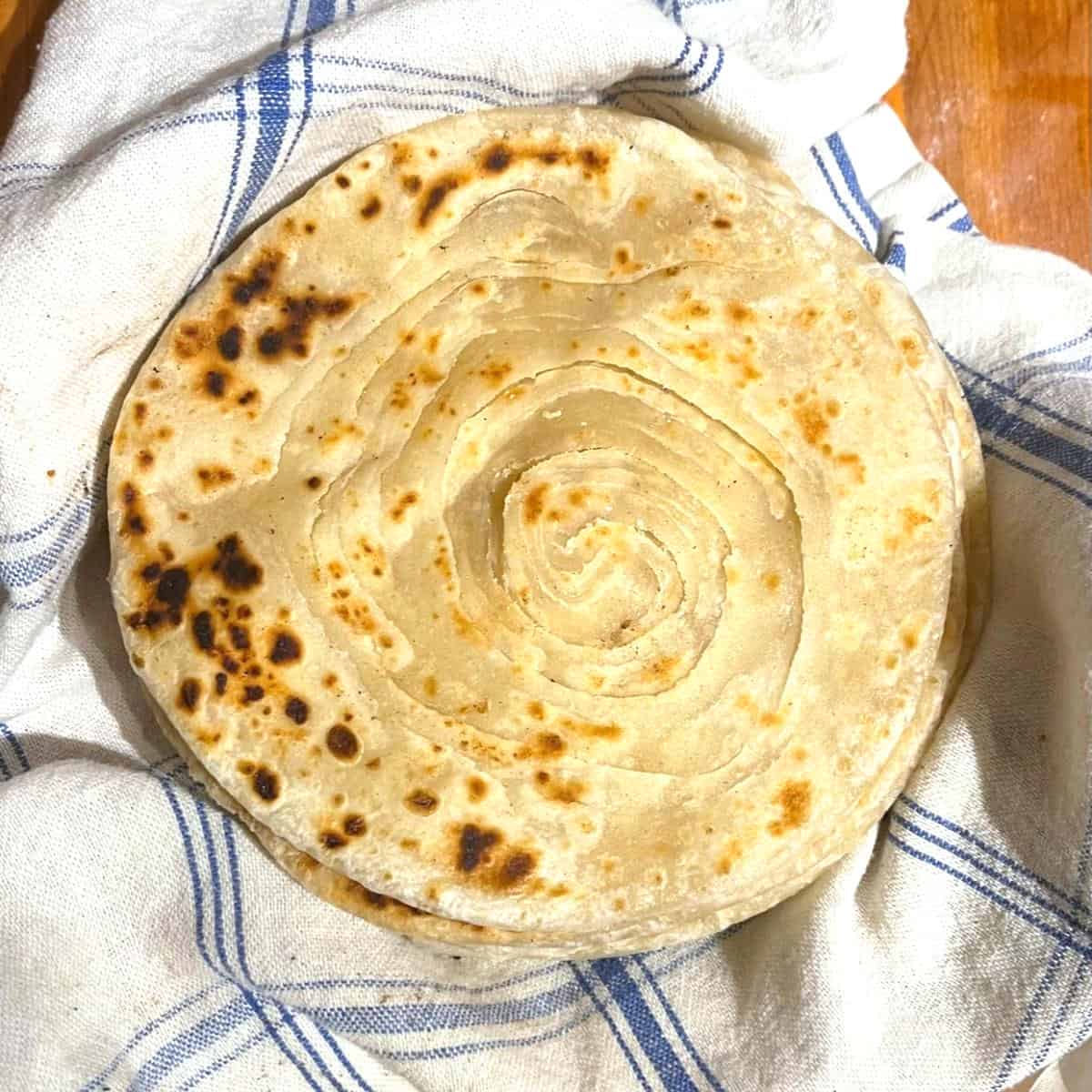 Paratha separated into layers after crushing.