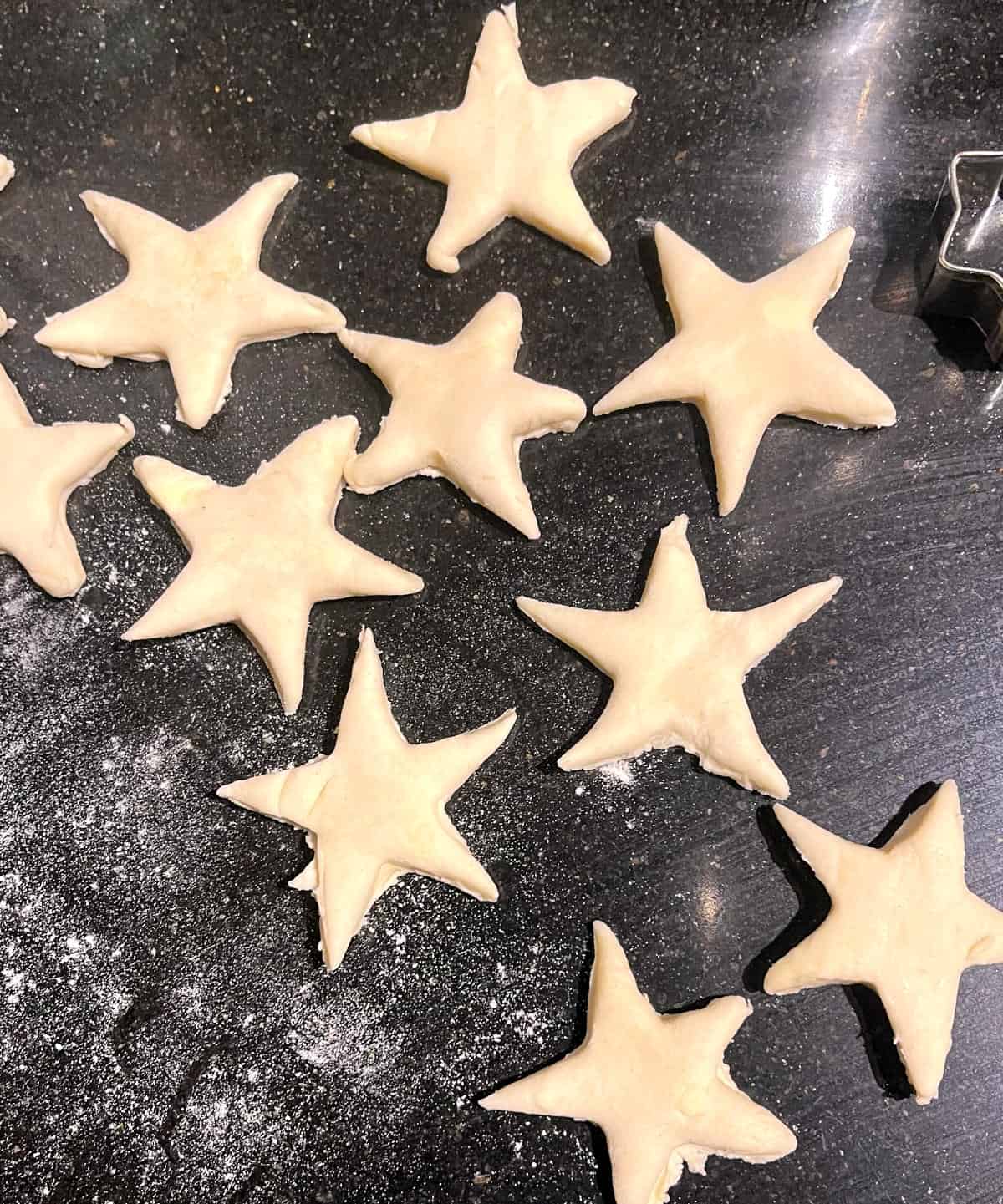 Star shapes cut out of pie dough.