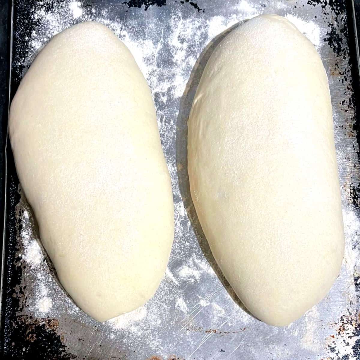 Italian bread loaves before baking.