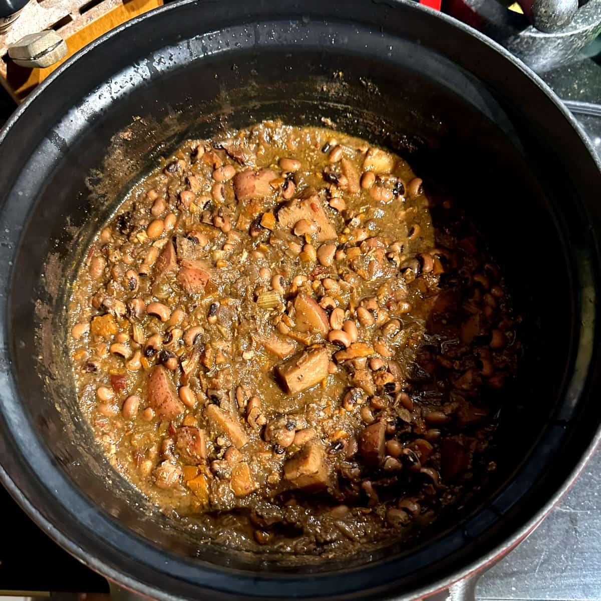 Black eyed peas, cooked, in slow cooker.