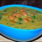 Canary beans curry in blue bowl.