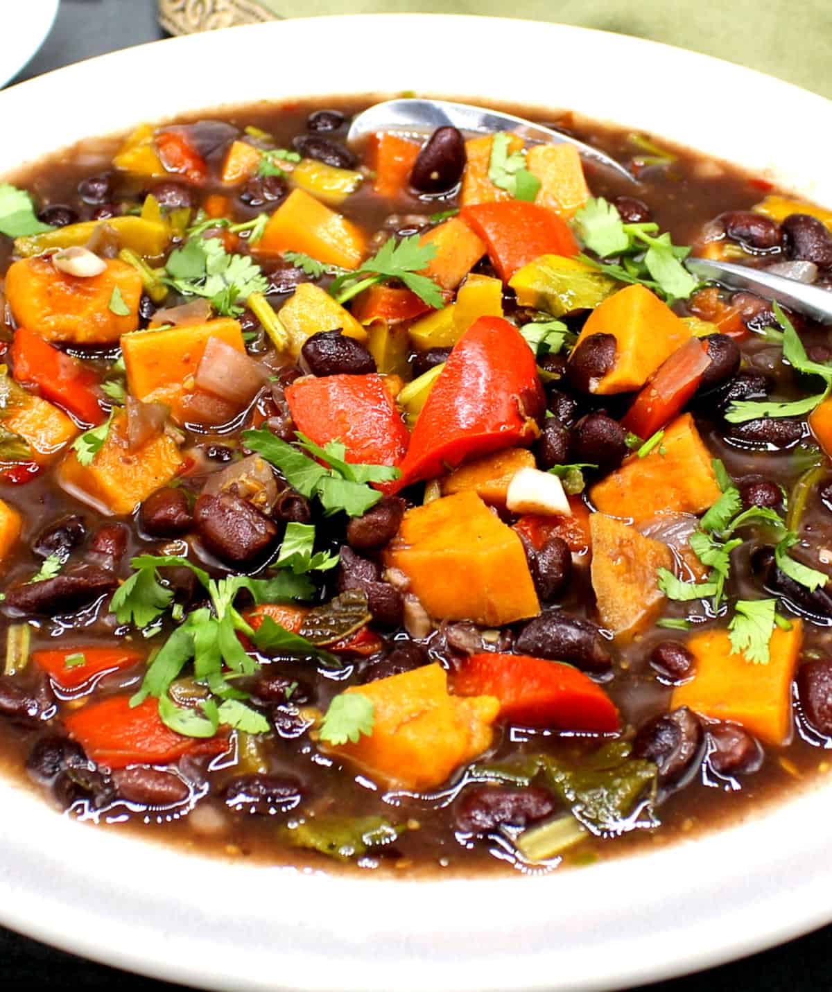Cuban black beans with vegetables and cilantro.