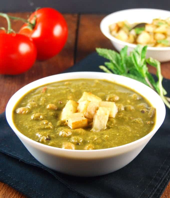 Saag Chana or Saag Chole, Chickpeas with Greens in bowl.