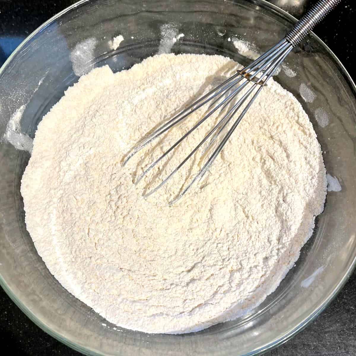Flours whisked in bowl for Irish hand pies.
