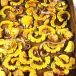 Roasted delicata squash with tempeh, onions and curry spices