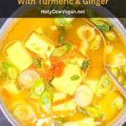 Miso soup in bowl with text that says "detox miso soup with turmeric and ginger".