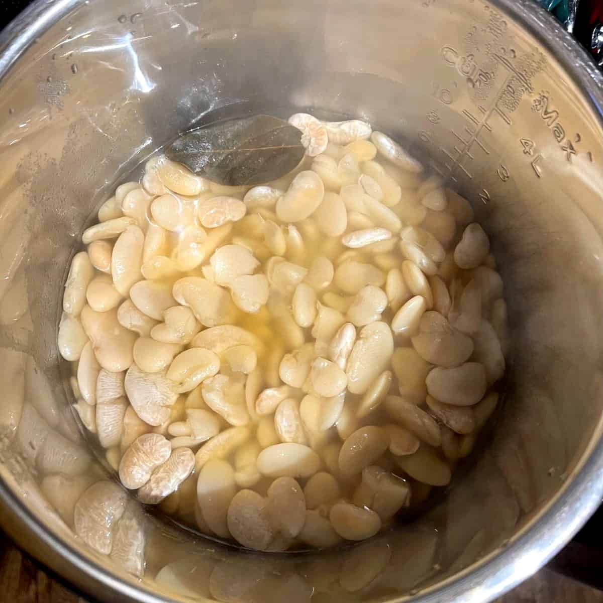 Cooked lima beans in Instant Pot liner.