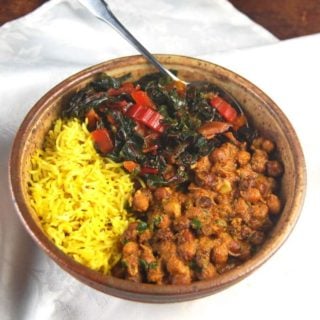 Curried Chickpeas Bowl with Turmeric Rice and Garlicky Chard