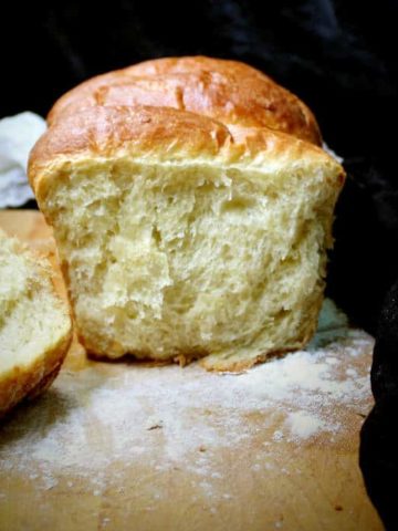 In this delicious, tender vegan olive oil brioche, aquafaba stands in for the eggs. The texture is light, feathery, and with a tight crumb, exactly the way a brioche is meant to be. #vegan, #brioche, #frenchbread | HolyCowVegan.net