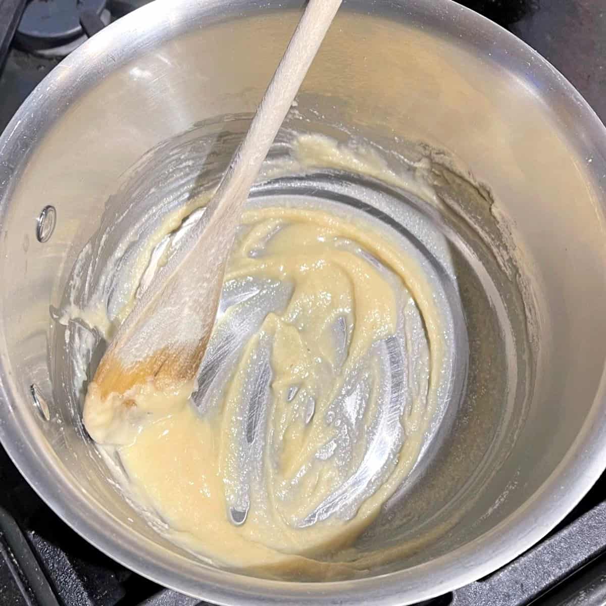 Roux cooked in saucepan.