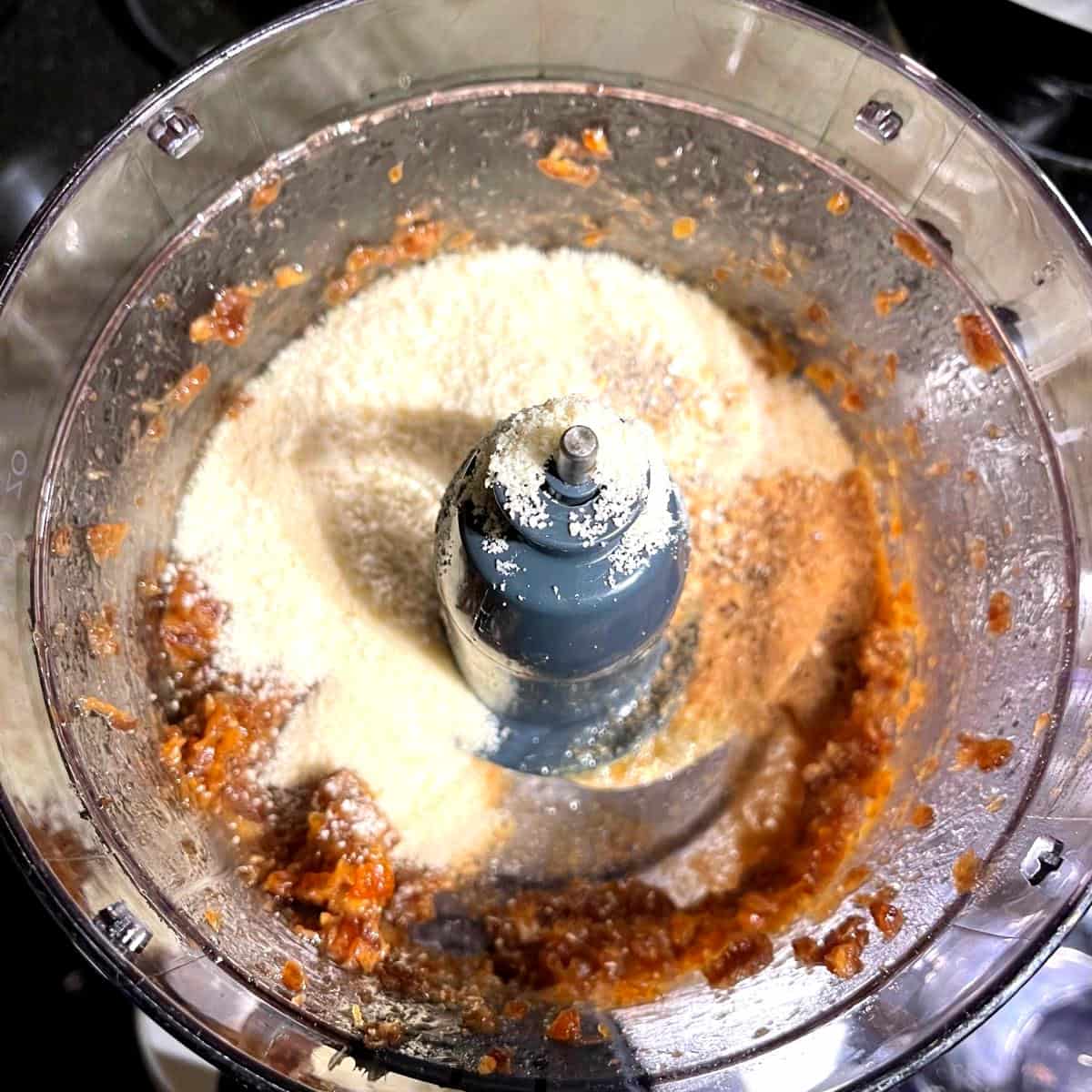 Ingredients for vegan almond flour cookies in food processor bowl.