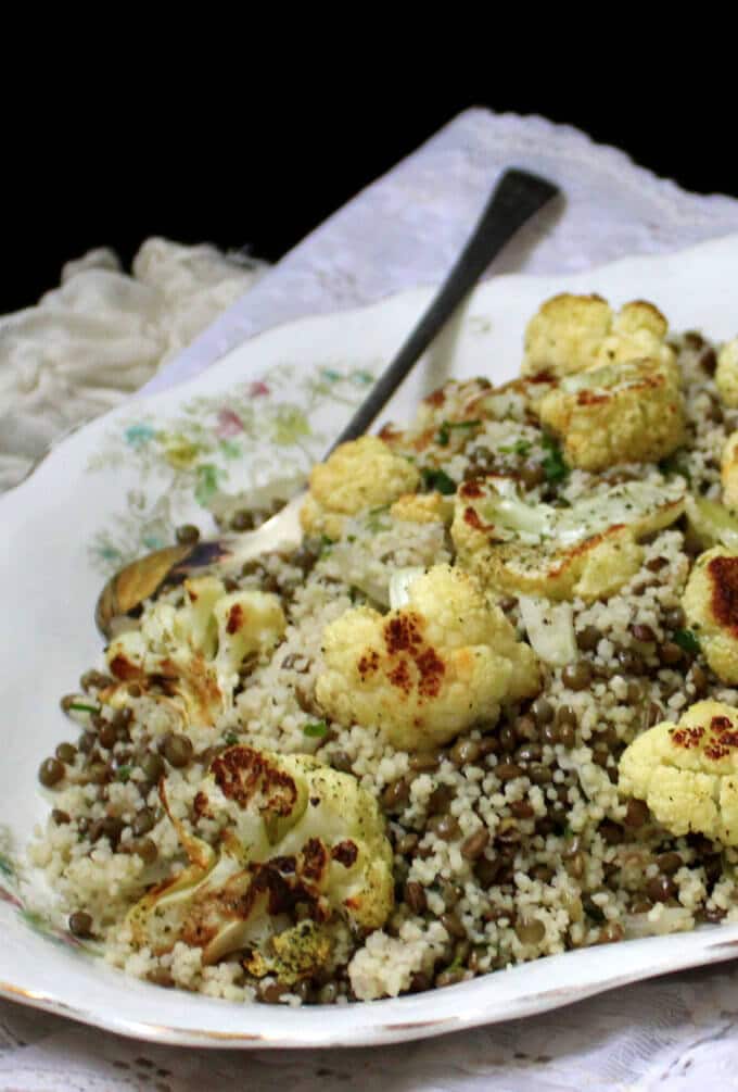 Closeup of vegan Roasted Cauliflower Couscous with Lentils and Mint.