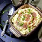 Easy and rather addictive Creamy Vegan Mashed Potatoes. The spuds are mashed, then whipped until they are fluffy and soft as clouds. They taste rich and decadent, exactly as the best mashed potatoes should. Vegan, soy-free and gluten-free. #vegan #soyfree #glutenfree #thanksgiving #potatoes HolyCowVegan.net