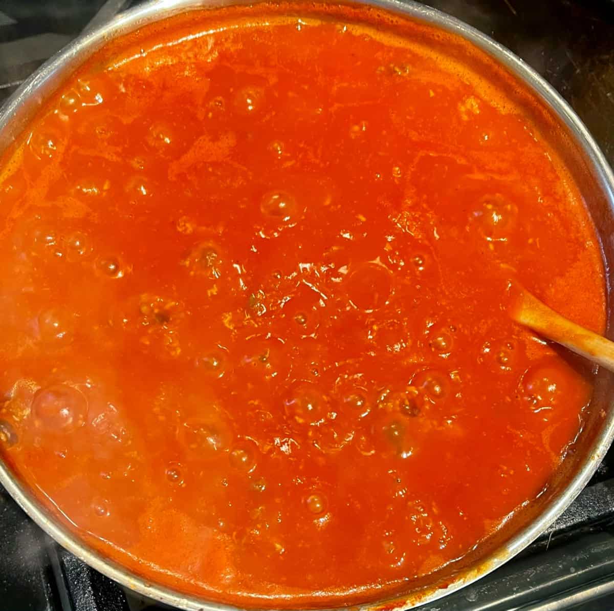 Marinara sauce cooking.