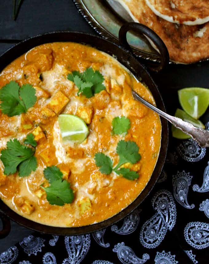 Vegan Butter Chicken with Tofu, a creamy, orange gravy with all six tastes of Ayurveda, with flavorful cubes of tofu. #vegan #tofu #curry #butterchicken #dinner #ayurveda HolyCowVegan.net