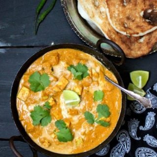 Vegan Butter Chicken with Tofu, a creamy, orange gravy with all six tastes of Ayurveda, with flavorful cubes of tofu. #vegan #tofu #curry #butterchicken #dinner #ayurveda HolyCowVegan.net