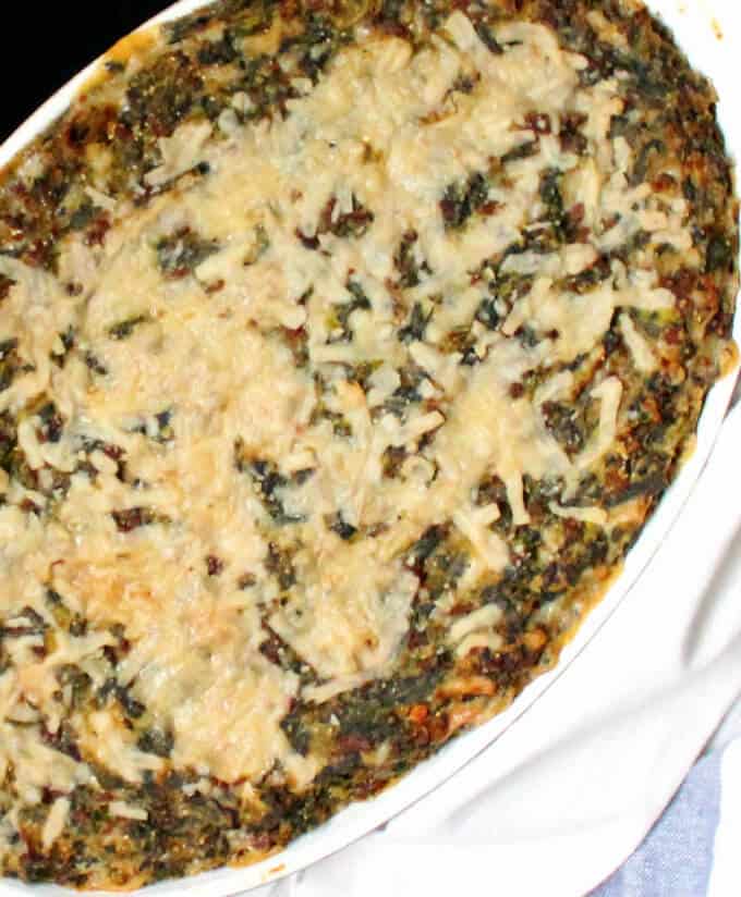 Closeup shot of a vegan grits and sausage quiche in casserole dish.