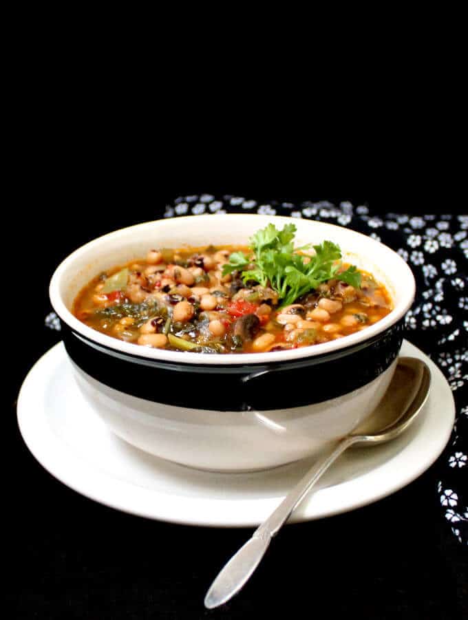 A vegan Instant Pot Spicy Southern Black Eyed Peas Stew is perfect for ringing in the New Year or just about anytime. This dish has all of the flavor of a Hoppin' John without the meat. #vegan #glutenfree #blackeyedpeas #cajun HolyCowVegan.net