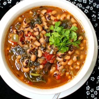 A vegan Instant Pot Spicy Southern Black Eyed Peas Stew is perfect for ringing in the New Year or just about anytime. This dish has all of the flavor of a Hoppin' John without the meat. #vegan #glutenfree #blackeyedpeas #cajun HolyCowVegan.net