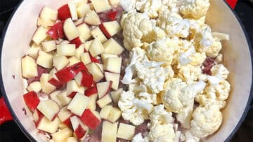 Potatoes and cauliflower in pan.