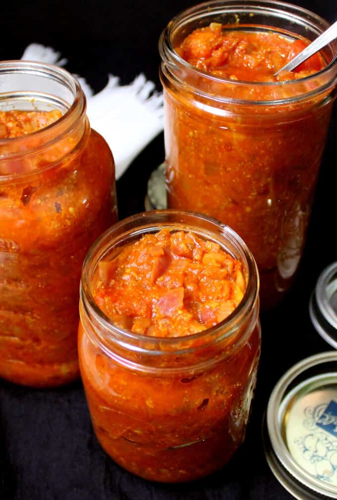 Basic Tomato Onion Masala Sauce in mason jars of different sizes.