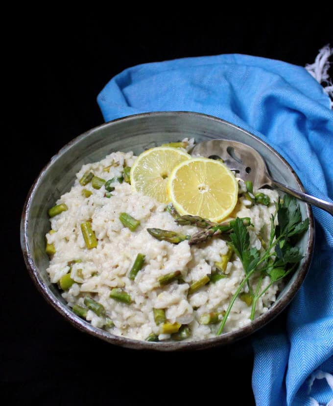 Creamy and delicious, this Vegan Asparagus Risotto is heaven in a bowl! #vegan, #glutenfree, #soyfree, #healthy, #dinnerrecipe HolyCowVegan.net