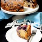 This vegan Blueberry Buttermilk Cake has a light yet moist crumb, hints of lemon and purple streaks of gooey, baked blueberries. #blueberries #cake #spring #dessert HolyCowVegan.net