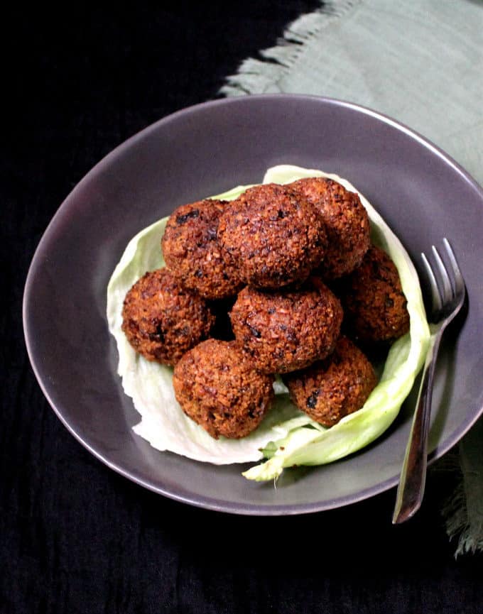 A mountain of perfectly cooked, golden falafel. #vegan #soyfree #glutenfree #nutfree #snack HolyCowVegan.net 