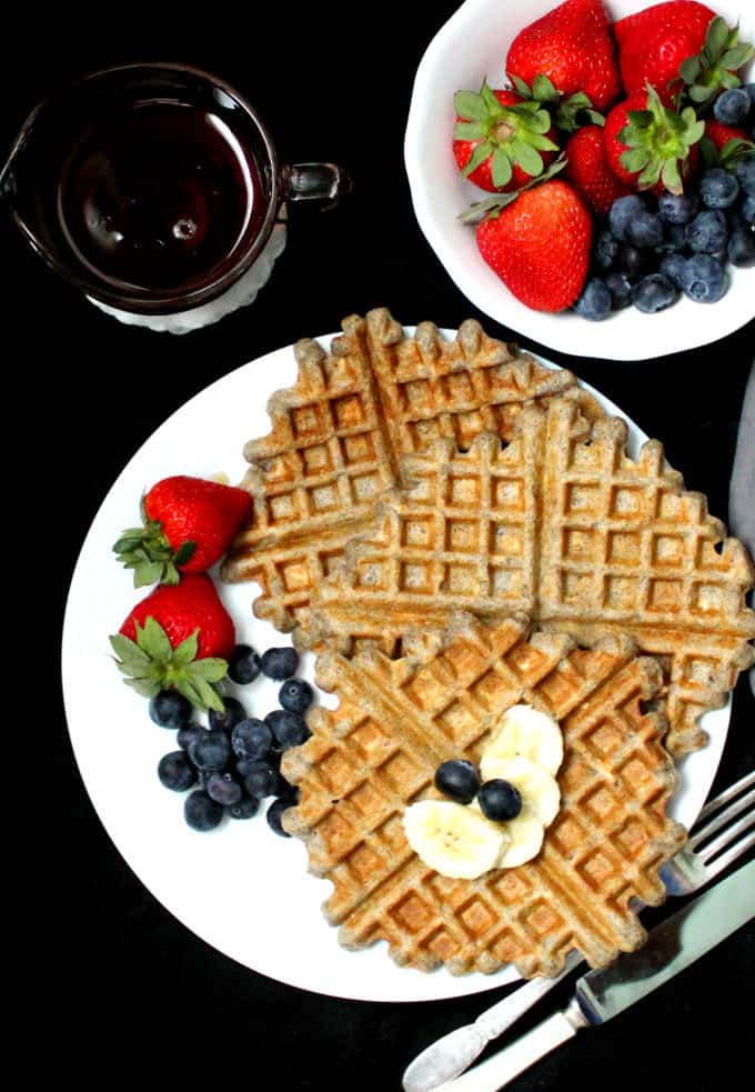 Vegan Gluten Free Sourdough Waffles that are tender and melt in your mouth. #waffles, #sourdough, #breakfast HolyCowVegan.net
