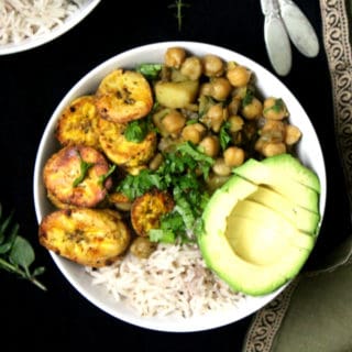 A delicious Caribbean Bowl with Coconut Rice, Chickpea Curry and Roasted Plantains