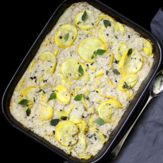 Vegan squash pudding with rice in baking pan.
