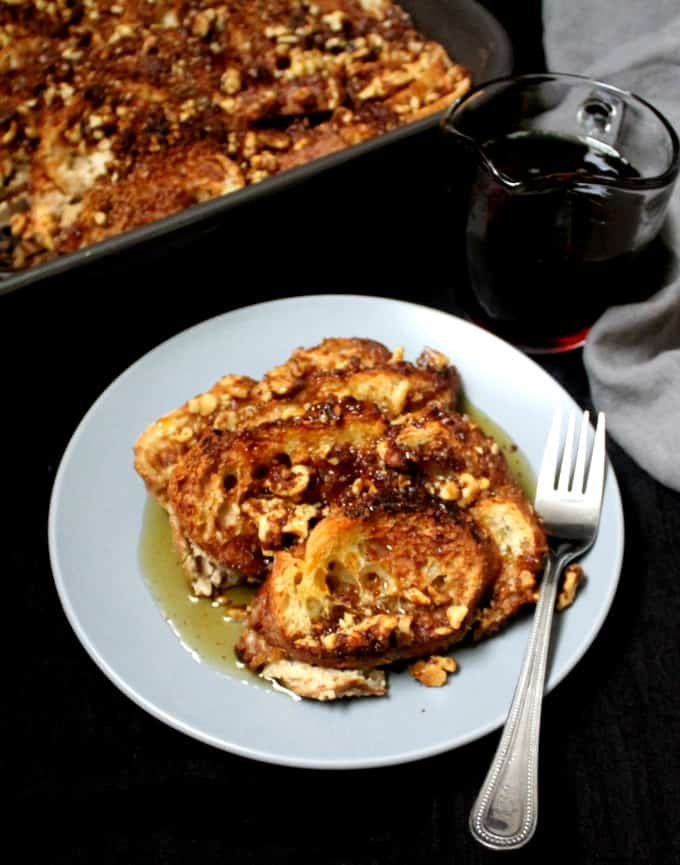A front view of a piece of French toast with the casserole in the background
