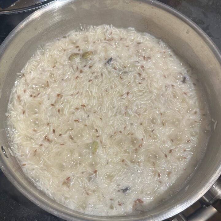 Jeera rice with most of the water absorbed.