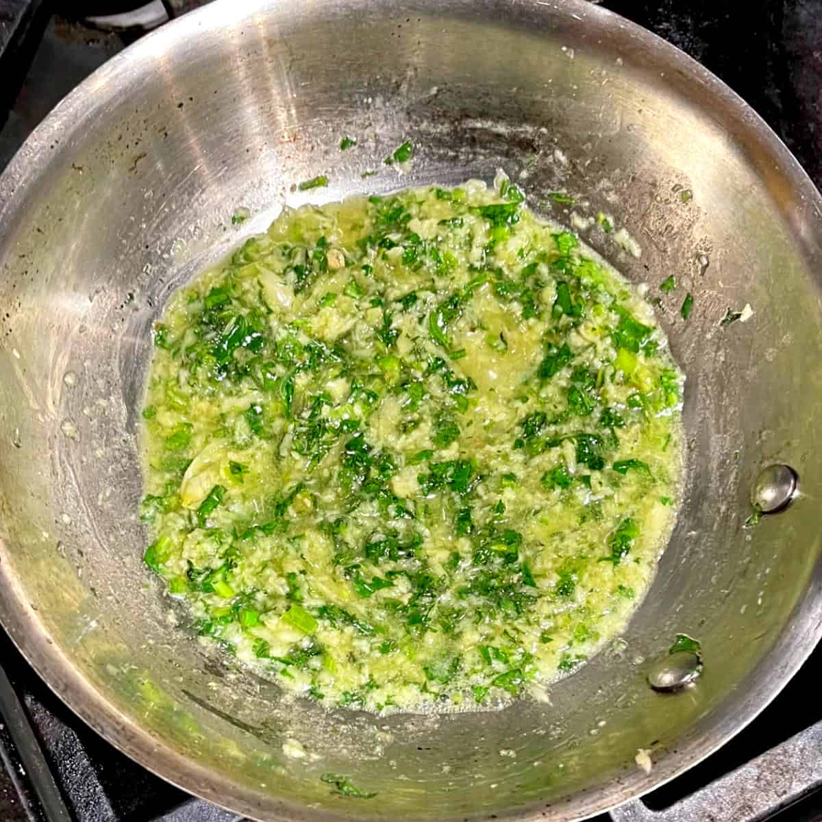 Vegan garlic herb butter in skillet.