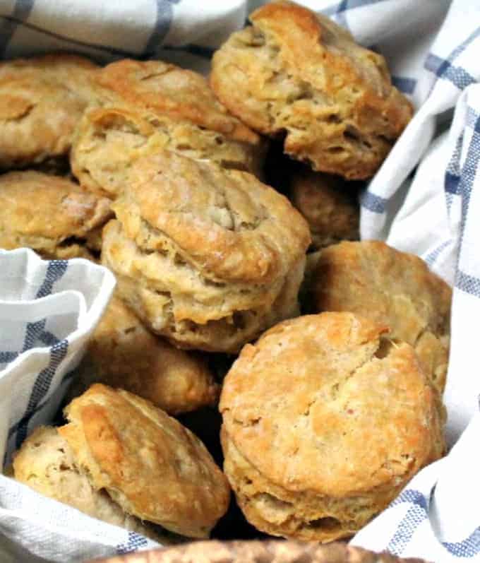 Vegan biscuits in a basket with a blue and white napkin