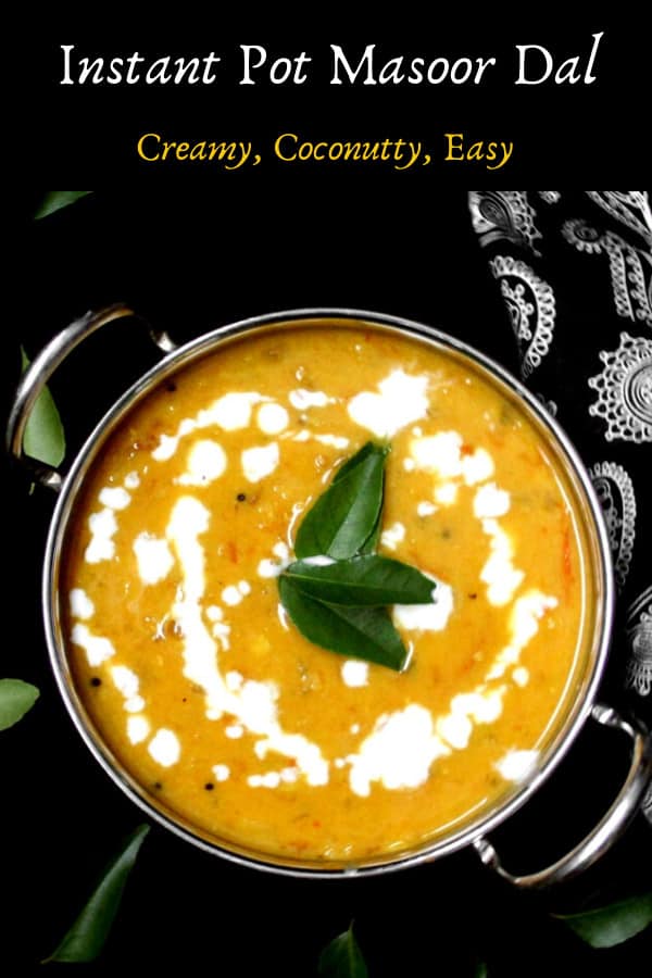 Creamy vegan Instant Pot Masoor Dal in a kadhai with curry leaves and cocnut milk.