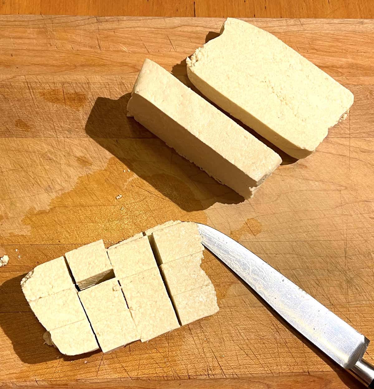 Tofu cut into cubes for air fryer.