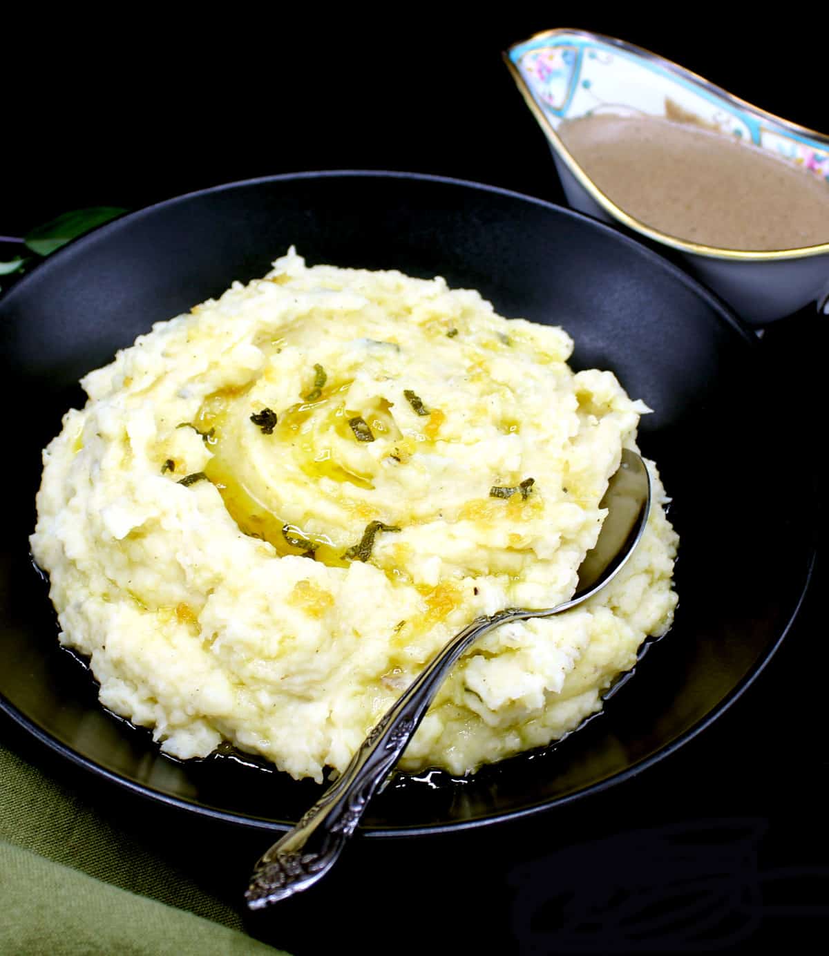 Vegan Instant Pot mashed potatoes in bowl with spoon.