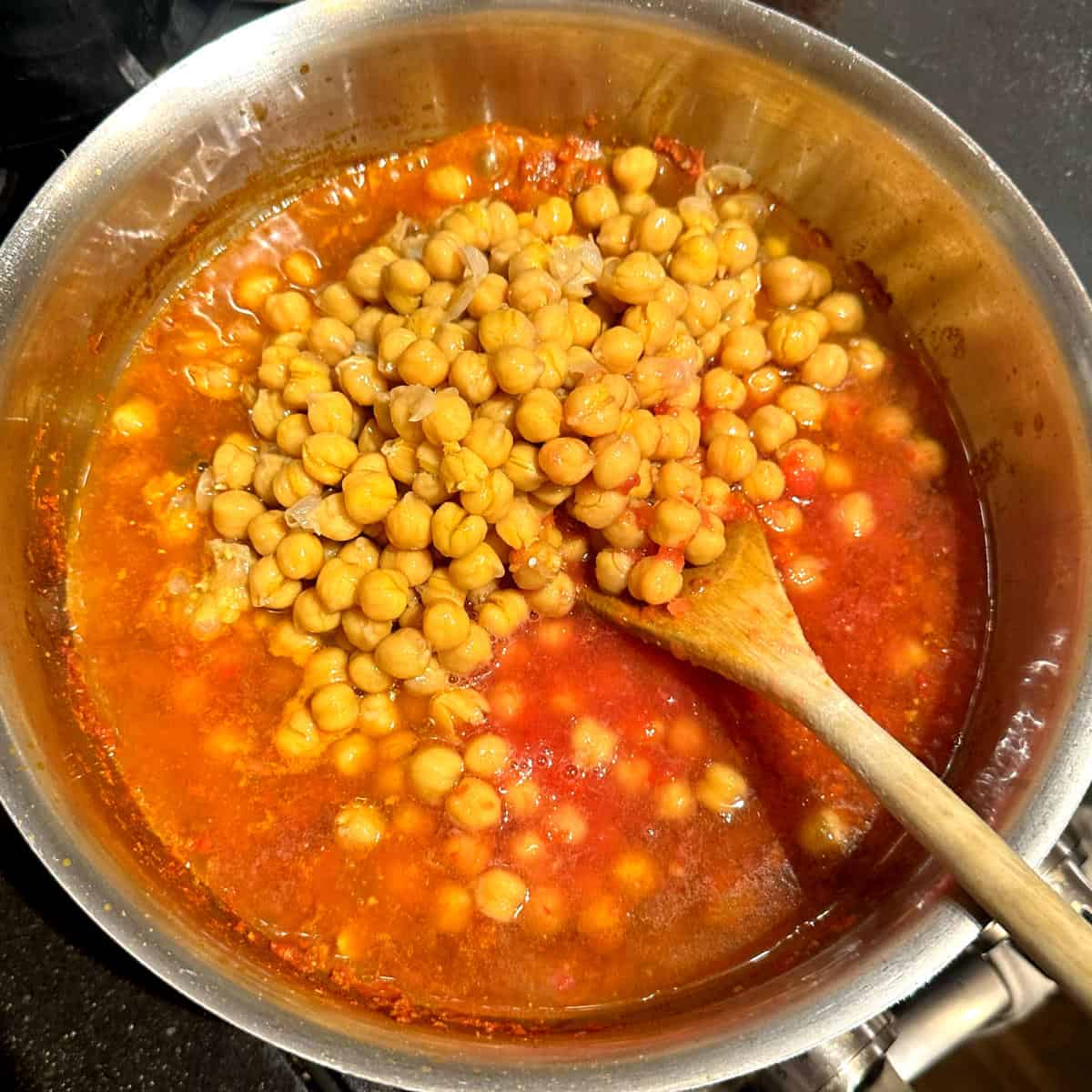 Chickpeas added to pot.