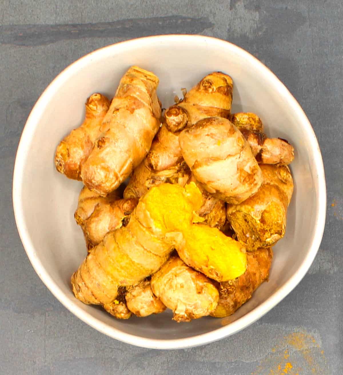 Fresh ginger root in a bowl