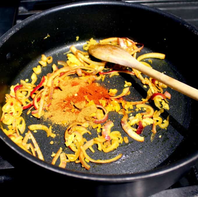 Spices added to skillet with onions.