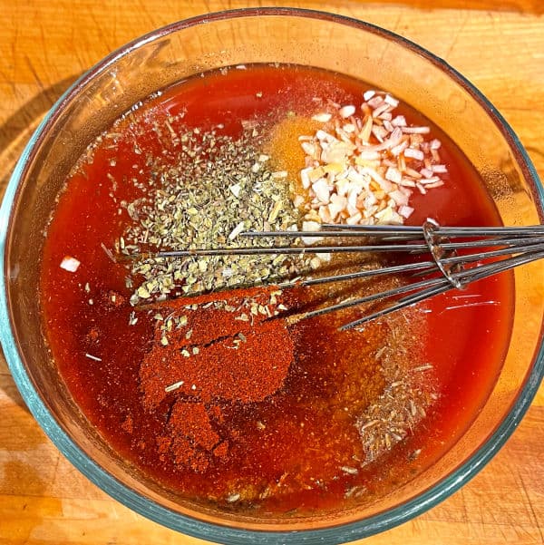 Spices and herbs added to enchilada sauce